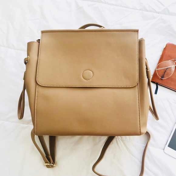 Shop Simple Essentials Handbags - Contemporary Vegan Leather Backpack- Beige Shop Simple Essentials Handbags - Contemporary Vegan Leather Backpack- Beige